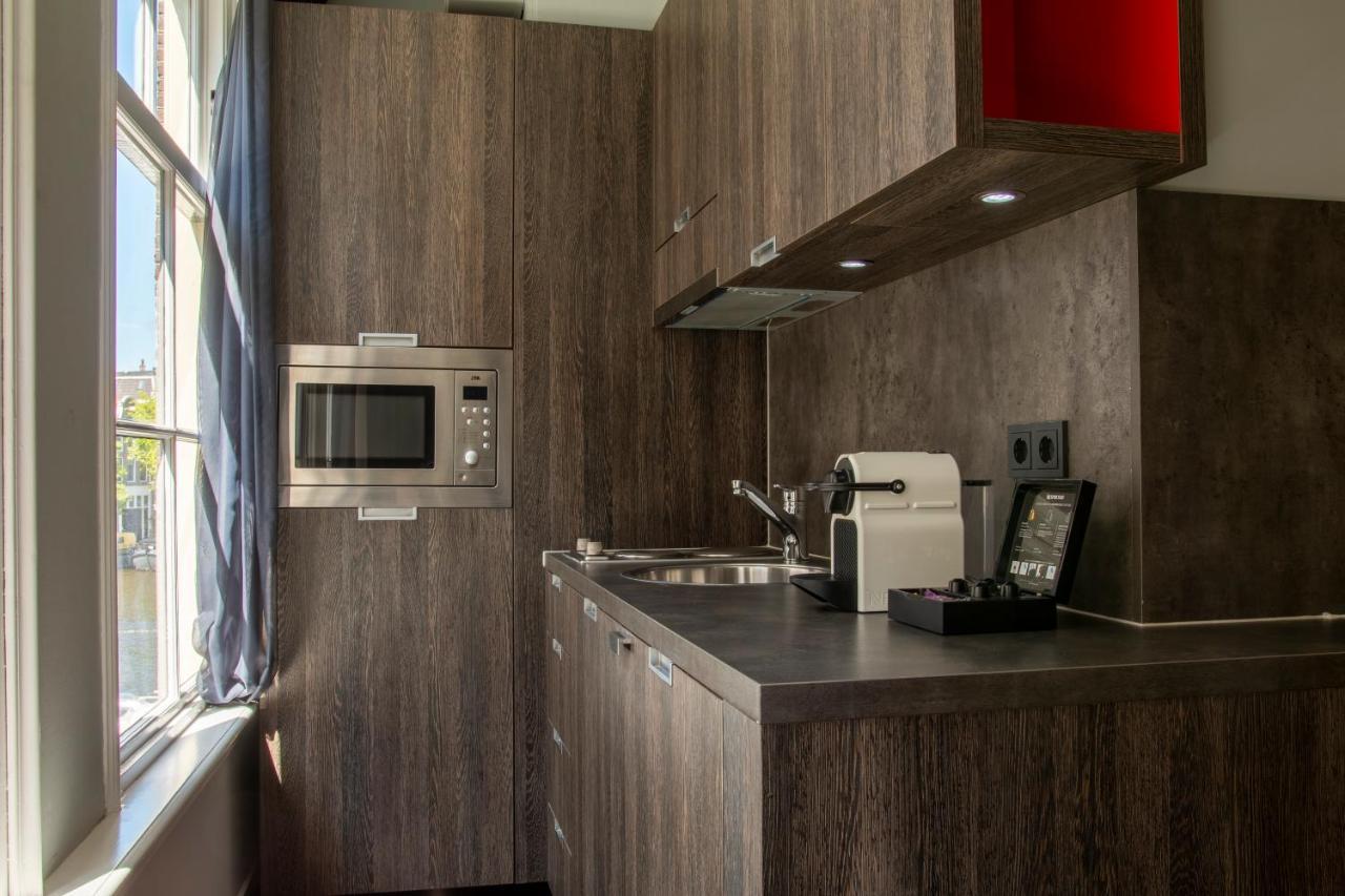אמסטרדם Eden Studios And Apartments מראה חיצוני תמונה